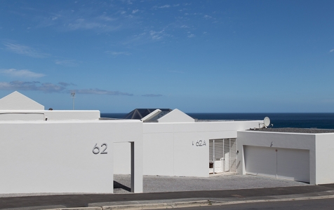 62 Camps Bay Drive’s street view is understated and slick. Oh what wonders lie beyond these walls…