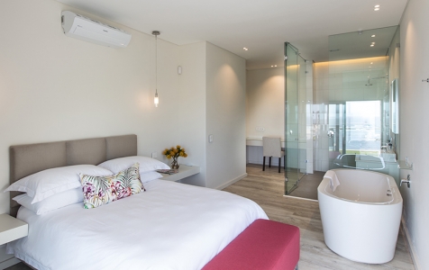Bedroom 2 on the ground floor offers you everything you need with its queen size bed, bath,  shower & Atlantic Ocean views.