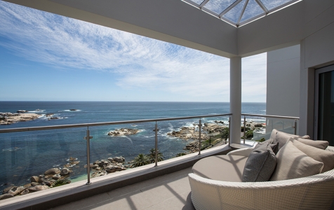 Uninterrupted views of the Atlantic Ocean greet you as you enter from street level. Open the patio doors, relax & unwind!
