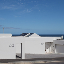 62 Camps Bay Drive’s street view is understated and slick. Oh what wonders lie beyond these walls…