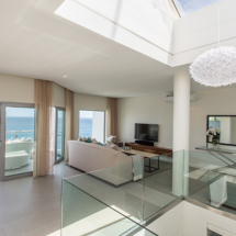 A world of luxury welcomes you when you swing open the doors to the entrance lobby and formal lounge at 62 Camps Bay Drive.