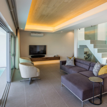 The living room on the middle level is bright, open and modern. Take in the breathtaking views from the comfortable couches and connect up to the cutting edge entertainment system fully Wi-Fi, Bluetooth and AirPlay enabled. DSTV, Netflix, online gaming and music on demand are all at your fingertips.