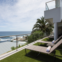 Pull up a recliner on the lower level patio and soak up the sun, sea and fresh air.