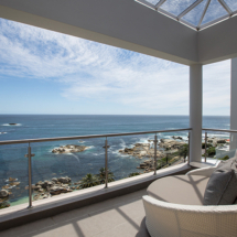 Uninterrupted views of the Atlantic Ocean greet you as you enter 62 Camps Bay Drive from street level. Open the doors to the entrance level patio, it’s time to relax and unwind!